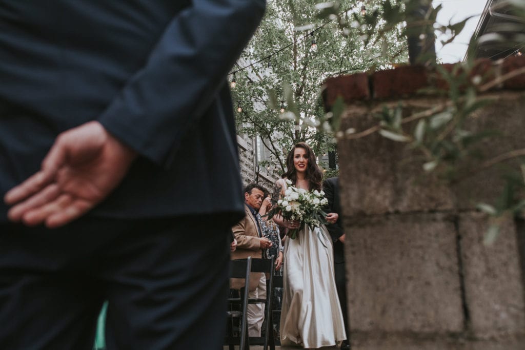 tattooed bride walking down aisle Opal 28 Wedding Photographer Marcela Pulido