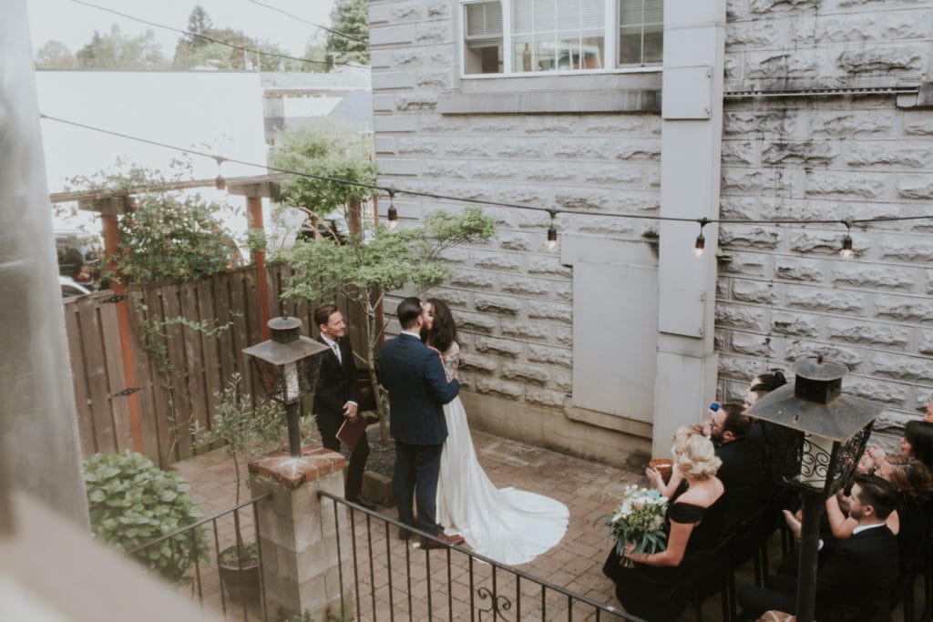 cafe lights aerial first kiss Portland Opal 28 Wedding Photographer Marcela Pulido