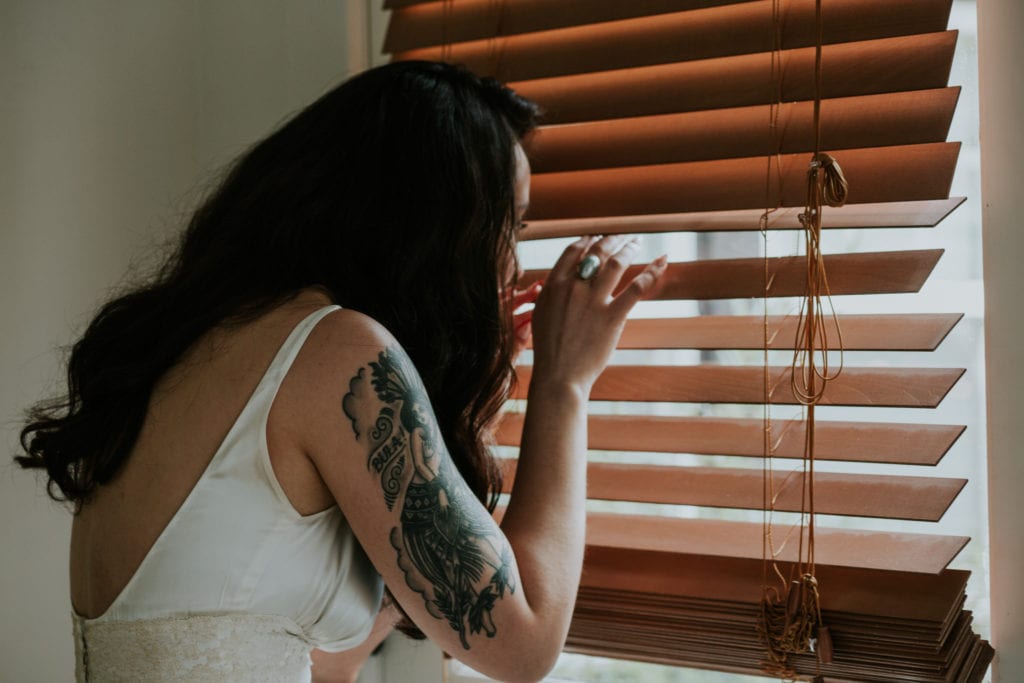 peeking bride tattooed Opal 28 Wedding Photographer Marcela Pulido