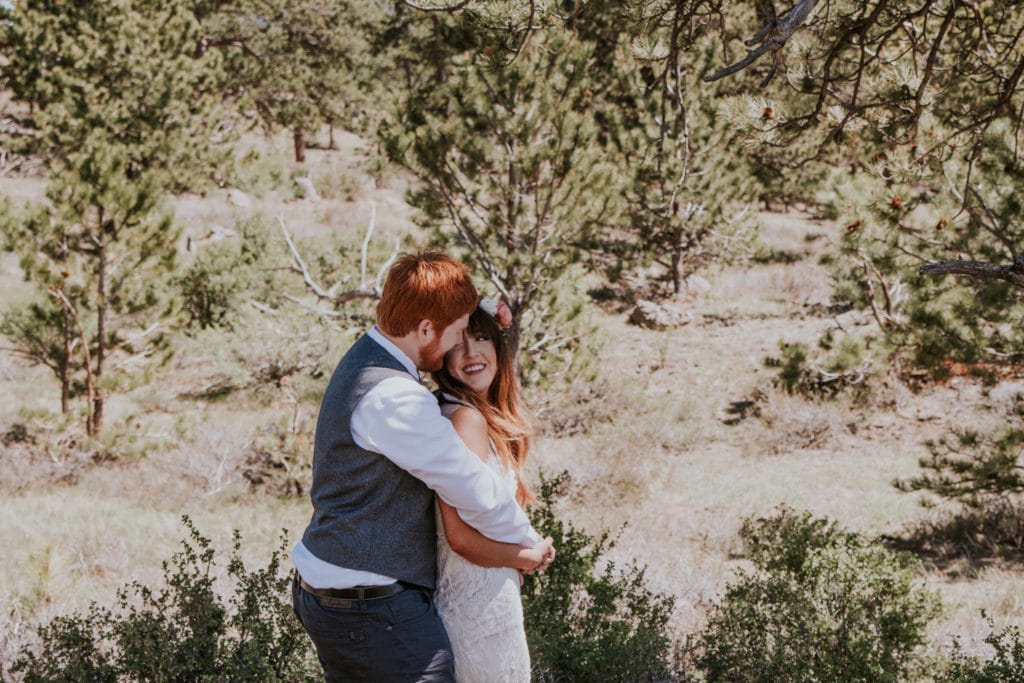bride and groom adventure session Estes Park Rocky Mountain Wedding Photographer