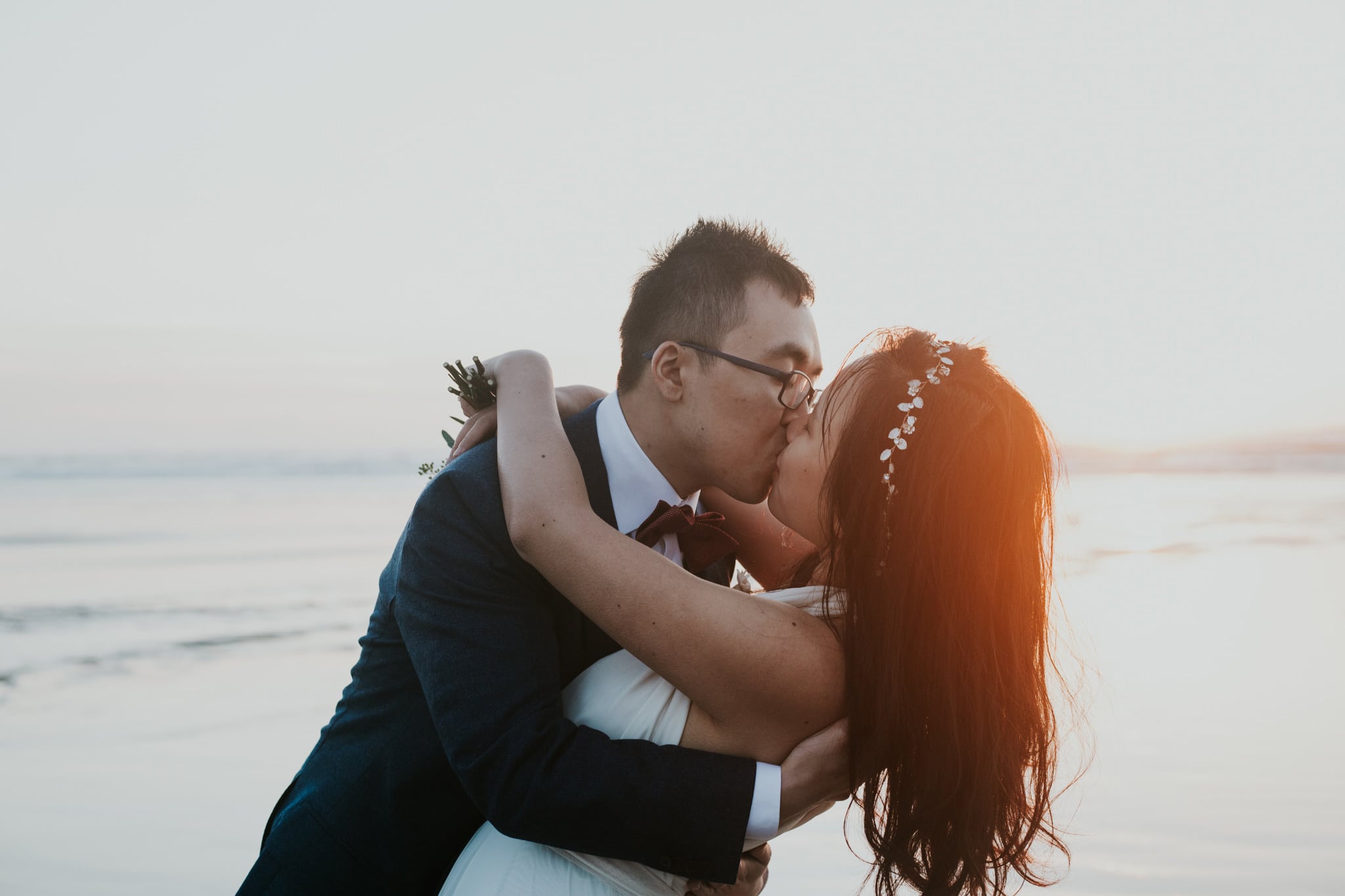 dip and kiss golden hour sunset coast Portland Wedding Photographer Marcela Pulido