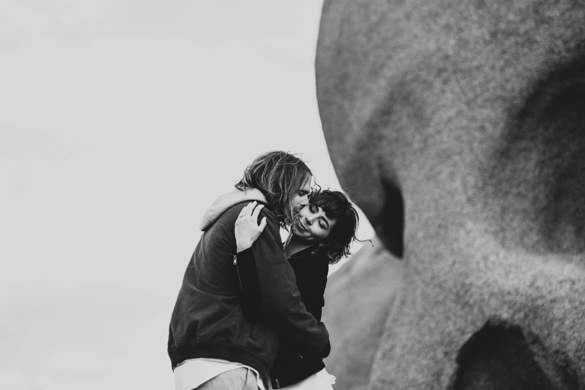 black and white kiss Joshua Tree Elopement Skull Rock Marcela Pulido Portland Wedding Photographer