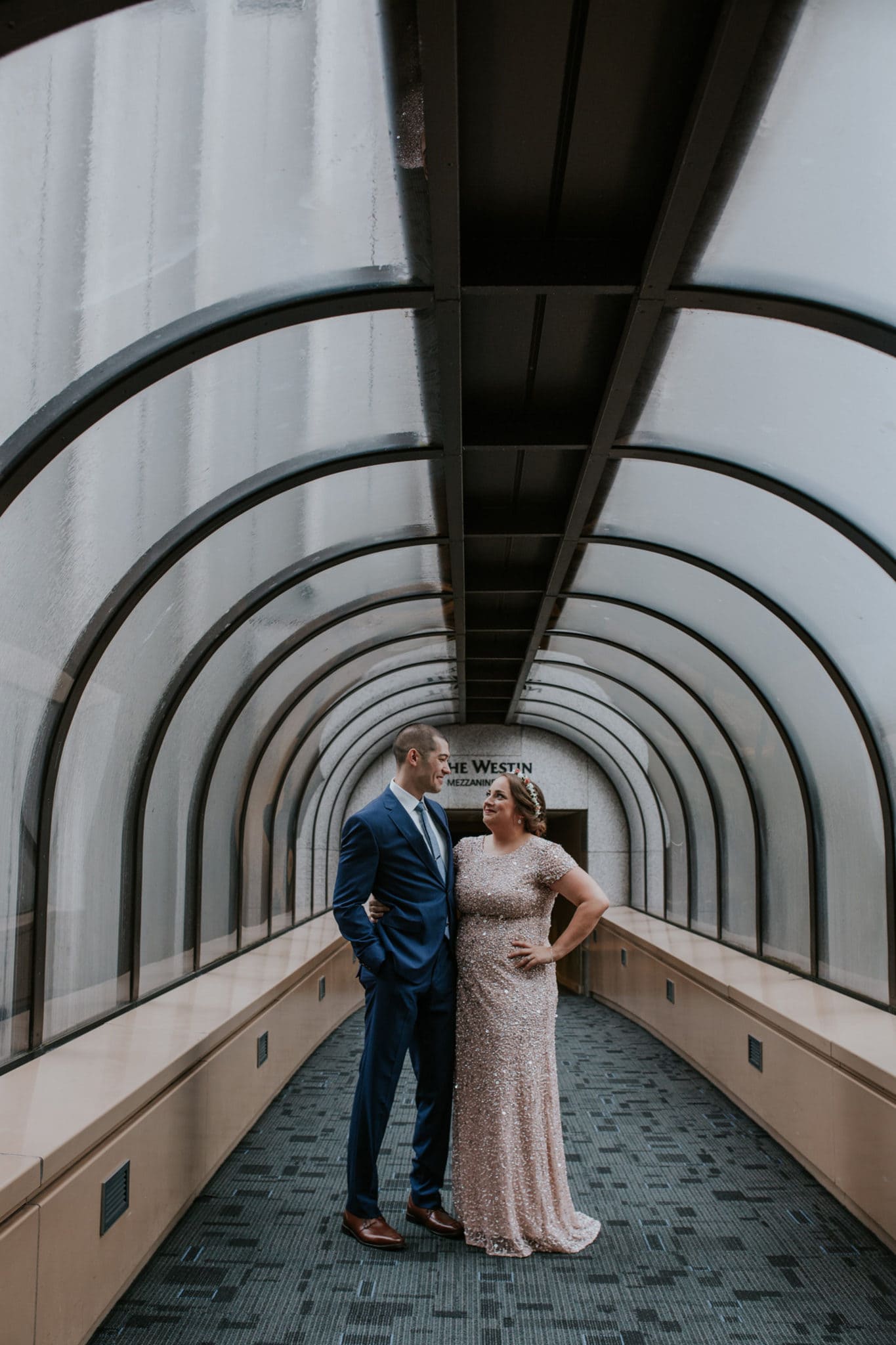 rainy first look at the Westin Seattle sky bridge Kubota Garden Wedding by Marcela Pulido Photography Portland Wedding Photographer