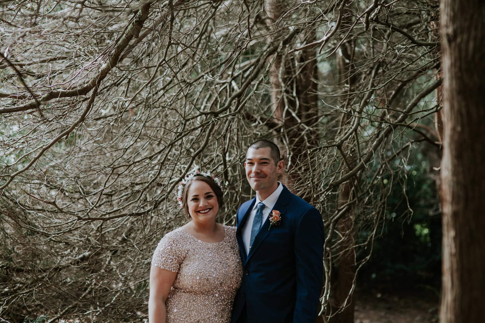 bride and groom in creepy branches Kubota Garden Wedding by Marcela Pulido Photography Portland Wedding Photographer