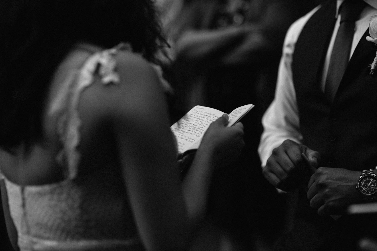 black and white Ruby reads vows to Cheo Oregon Columbia River Gorge elopement