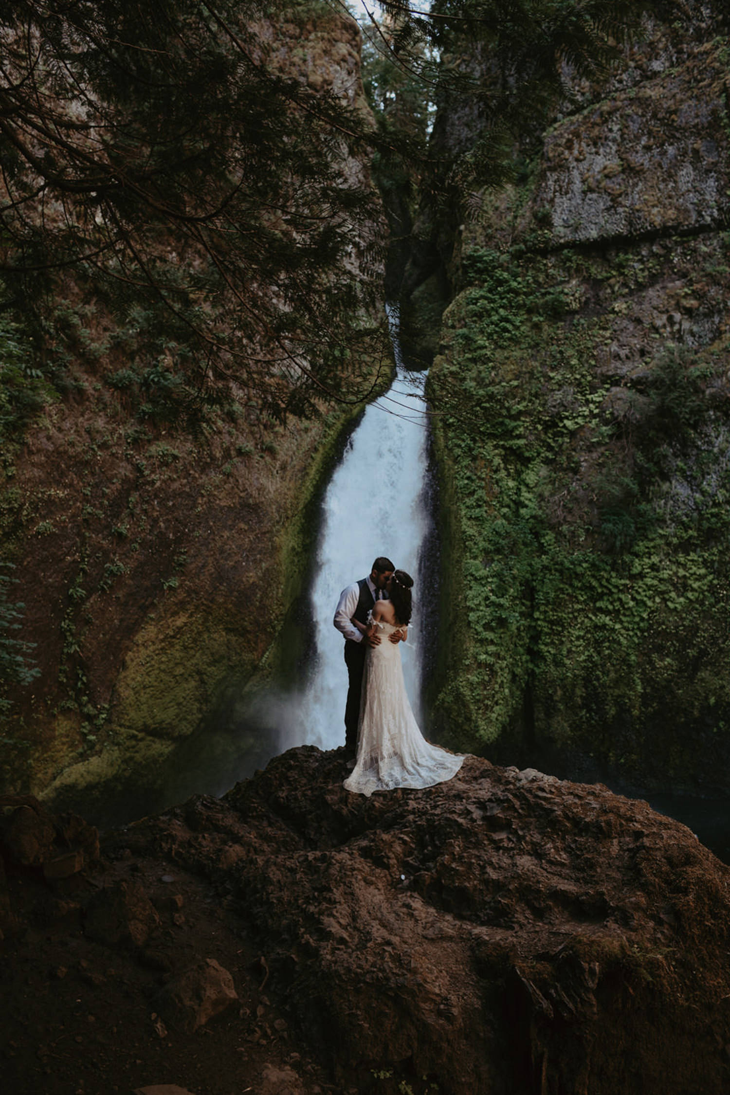 newlywed bride and groom in front of Wahclella Falls Oregon Columbia River Gorge elopement