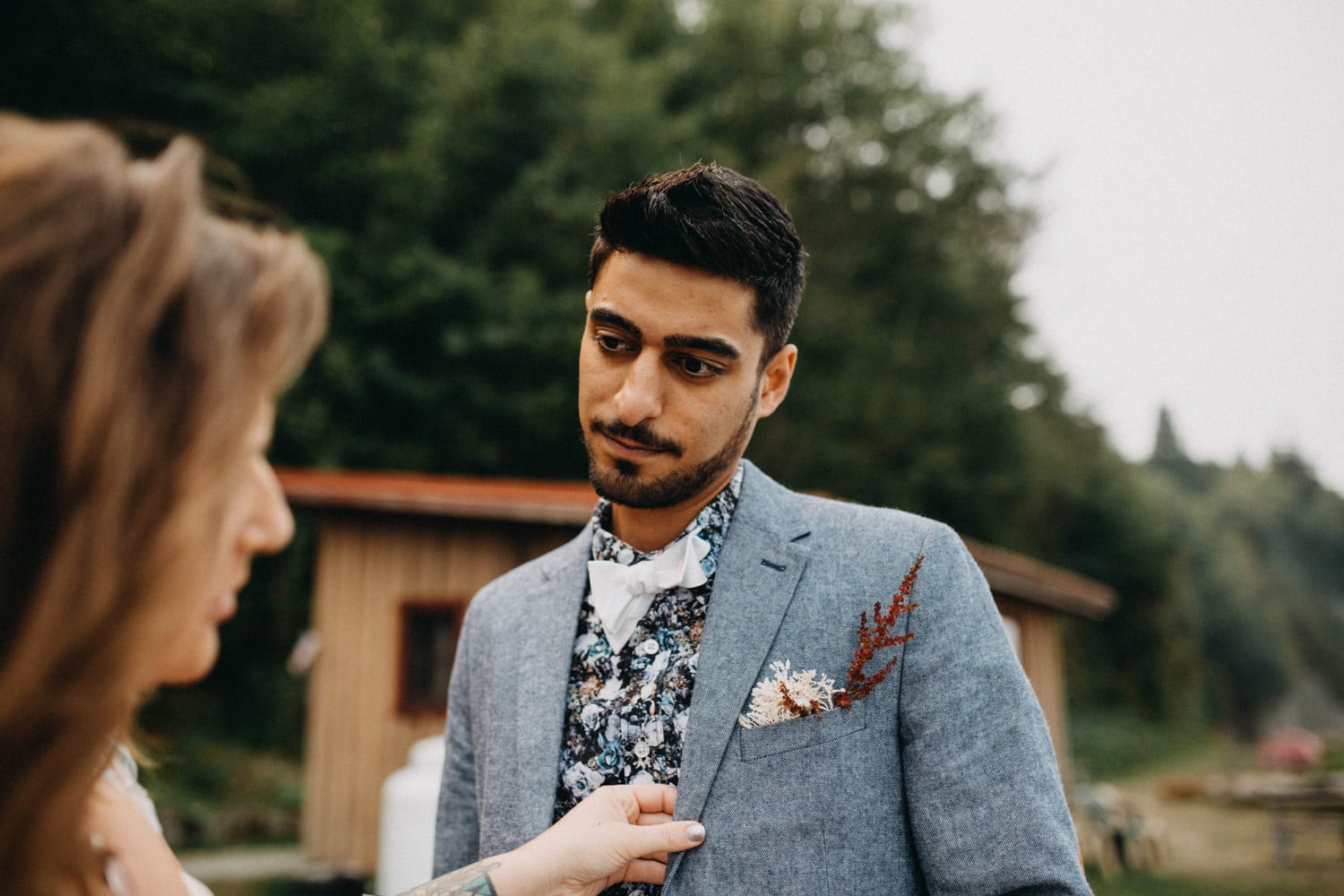 groom staring at his bride in earnest on his olympic peninsula elopement wedding day by marcela pulido photography