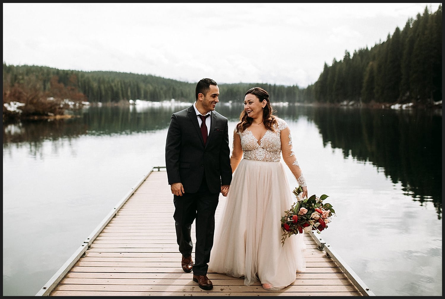 lace long sleeve wedding dress and burgundy bouquet on Clear Lake Wedding