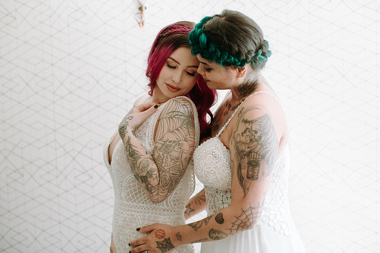 romantic beautiful pink and green haired tattooed mexican lesbian brides on their wedding day by marcela pulido photography portland wedding photographer