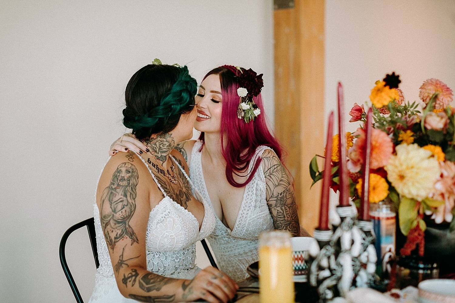 beautiful and edgy same sex lesbian couple cheers and toast on their wedding day mexican wedding photographed by Marcela Pulido Photographer Portland Wedding Photography