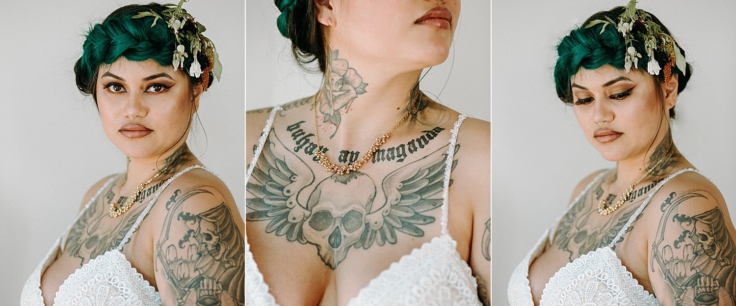 stunning green haired tattooed rock and roll bride with chest tattoo and flowers in her hair on her wedding day photographed by Marcela Pulido Photographer Portland Wedding Photography