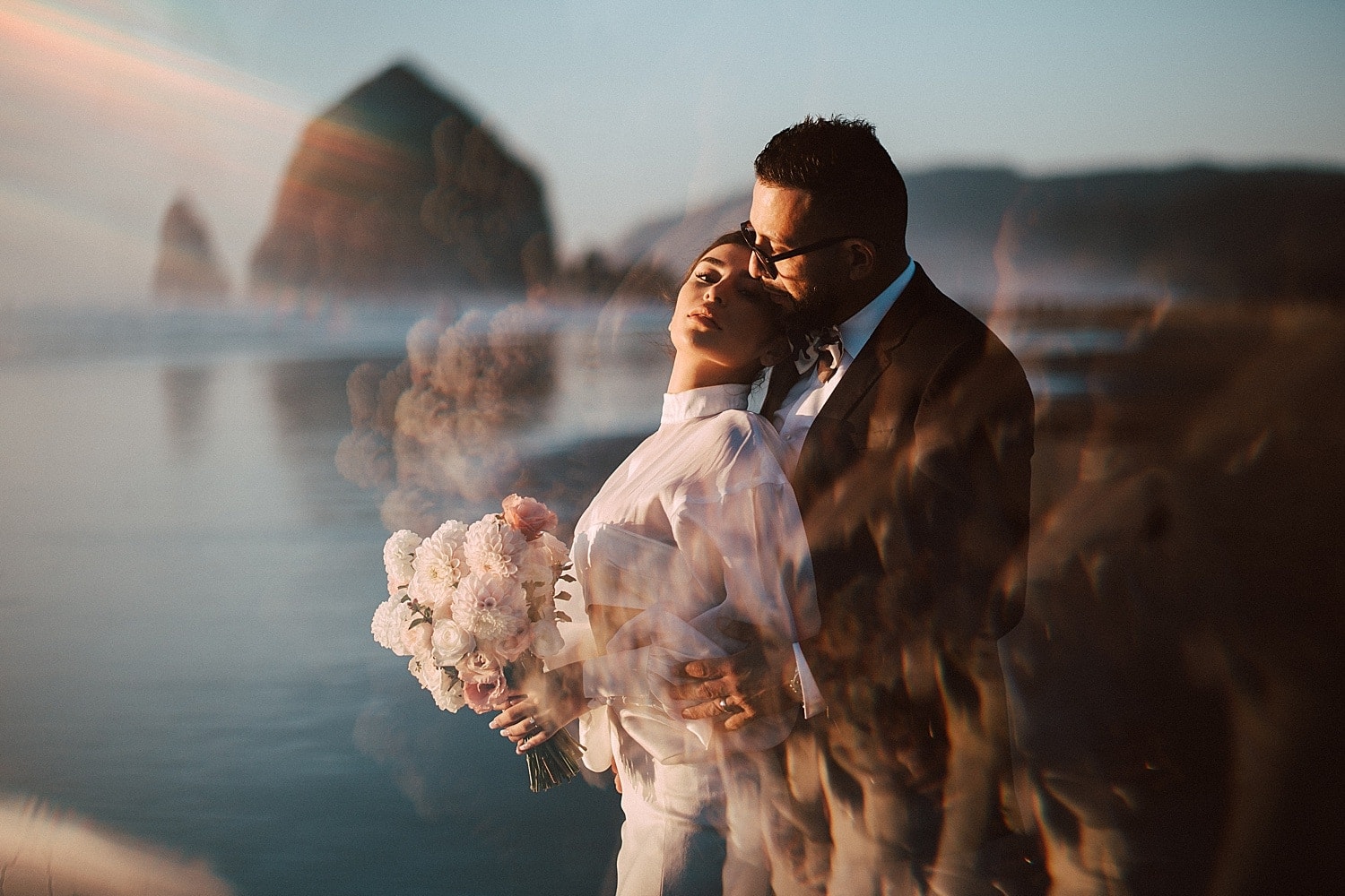 dreamy ethereal portrait of newlywed couple on cannon beach captured by marcela pulido portland oregon wedding photographer