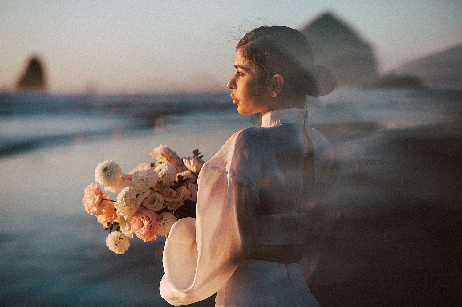 stunning latina bride at sunset golden hour dreamy light at cannon beach captured by marcela pulido portland oregon wedding photographer